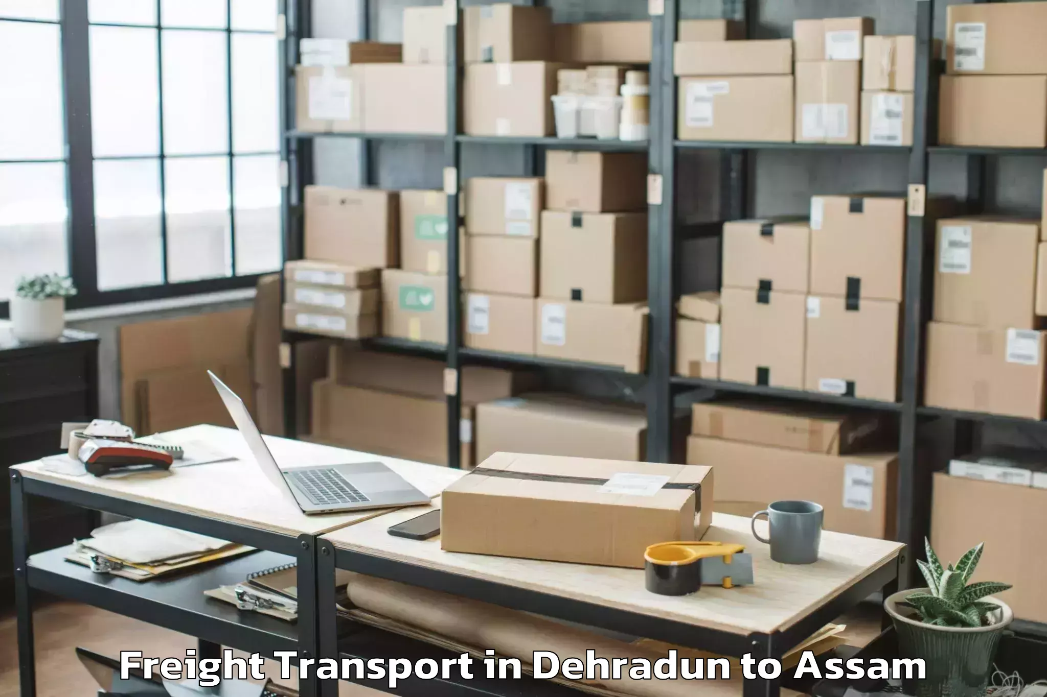 Easy Dehradun to Sorbhog Freight Transport Booking